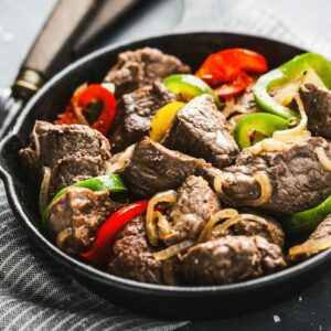 Cookef beef cuts with vegetables