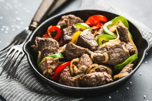 Cookef beef cuts with vegetables